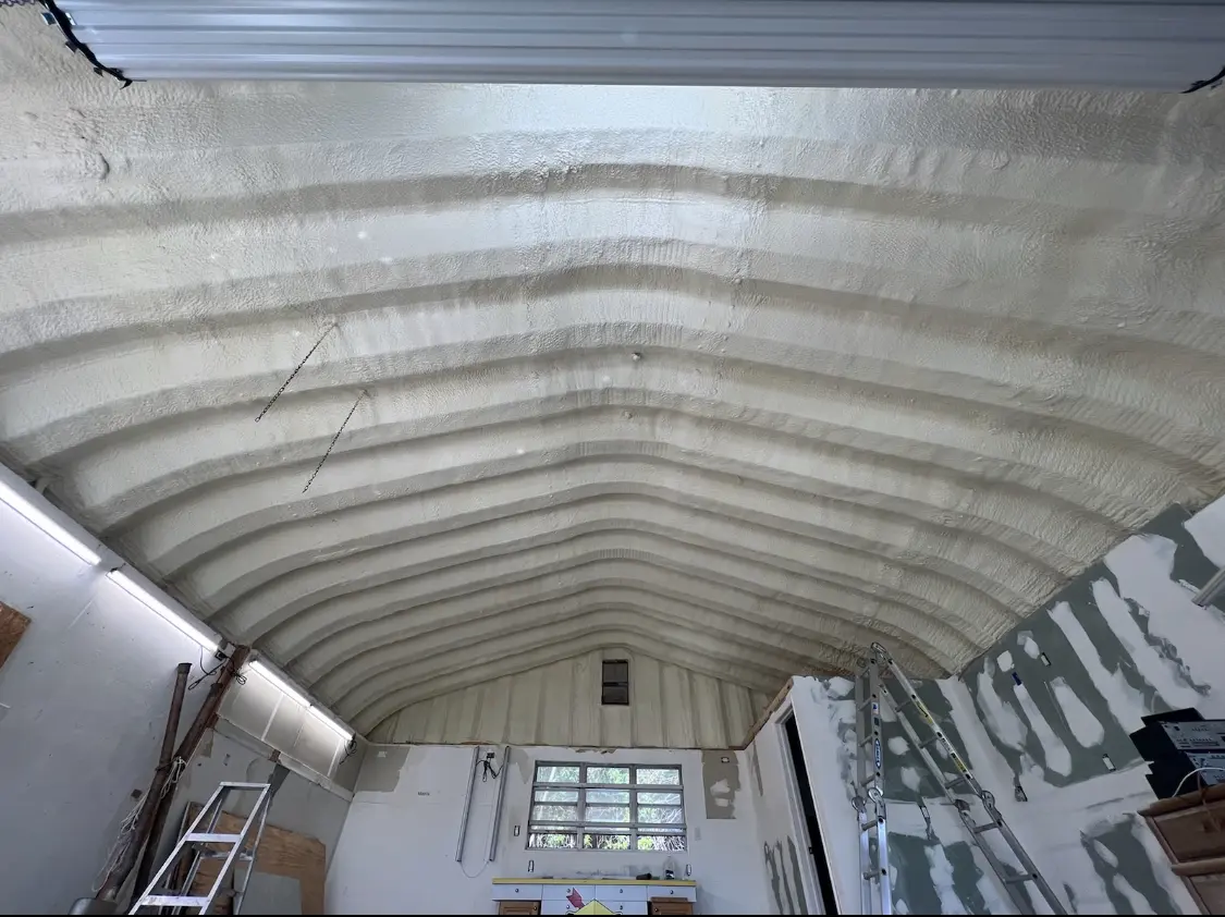 Spray polyurethane foam applied to the underside of a metal roof deck in Dana Point